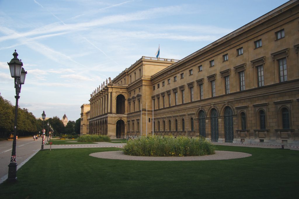 The Hercules Hall surrounded by greenery under the sunlight at daytime in Munich in Germany