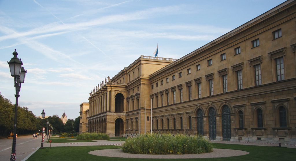 The Hercules Hall surrounded by greenery under the sunlight at daytime in Munich in Germany